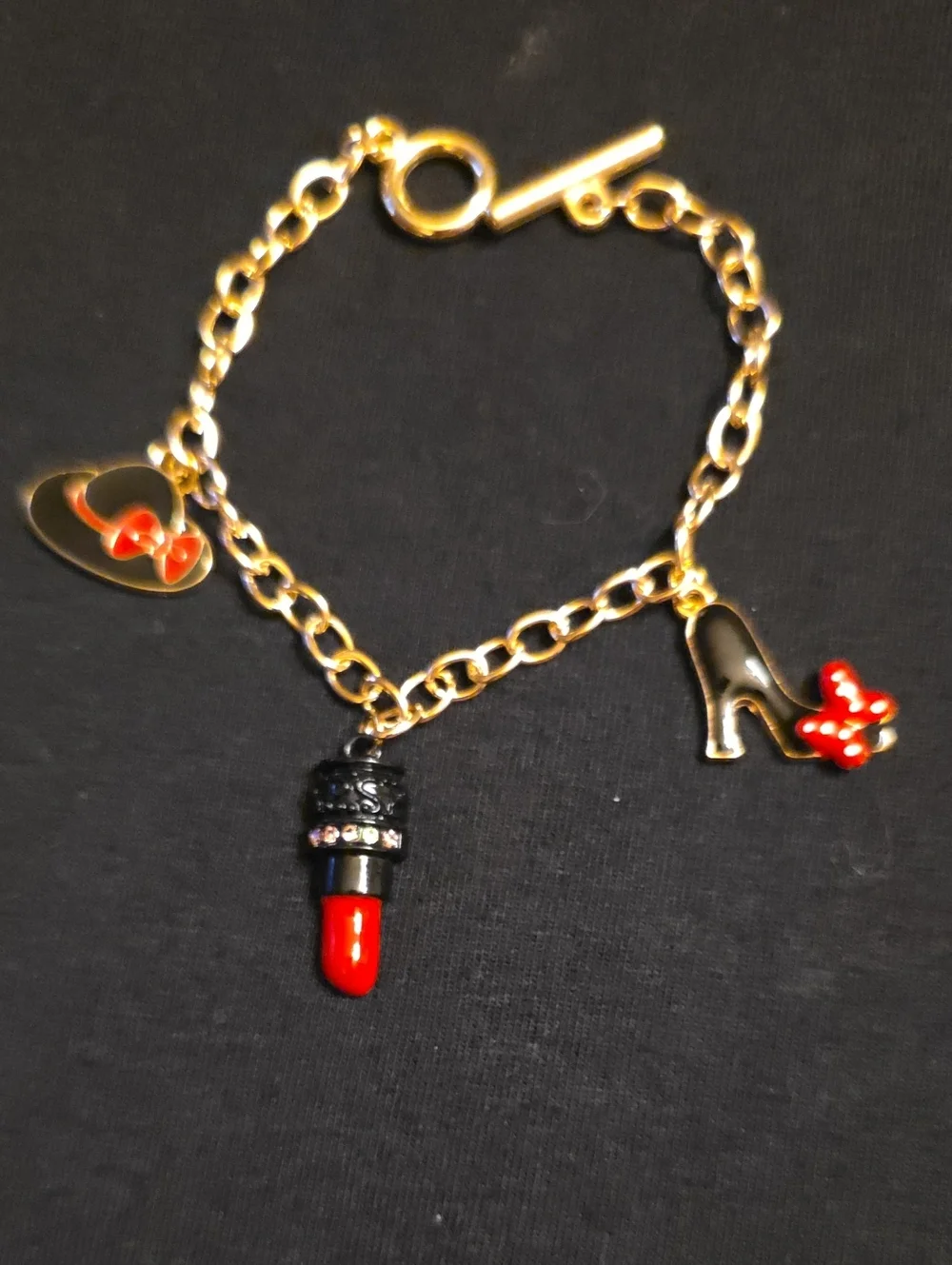 Gold-Tone Charm Bracelet with Red Enamel Accents
